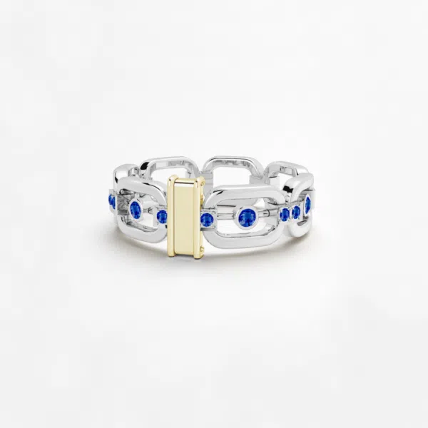 Anneau maillon en or blanc 18 carats avec des pierres saphirs bleus et une barrette en or jaune