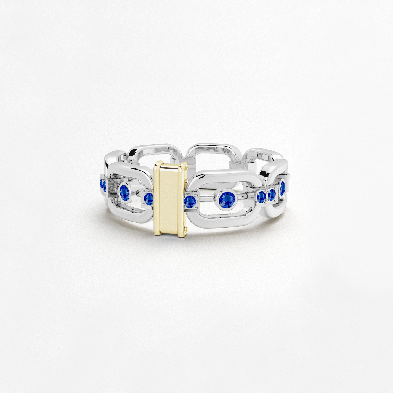 Anneau maillon en or blanc 18 carats avec des pierres saphirs bleus et une barrette en or jaune