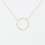 Pendentif en or rose 18 carats en forme d'anneau torsadé avec diamant et barrette en or blanc