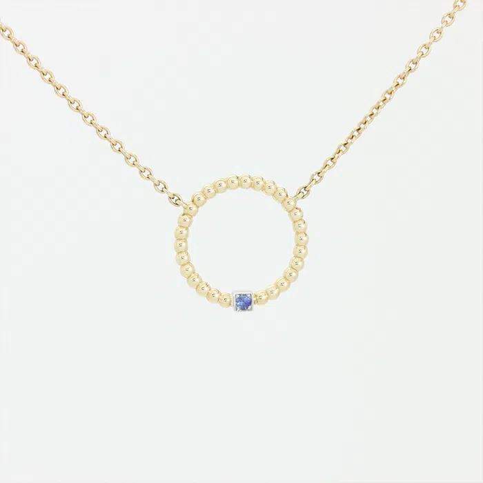Pendentif en or jaune 18 carats en forme d'anneau perlé avec un diamant en or blanc et une pierre saphir bleu