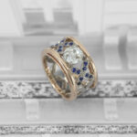 Bague bandeau diamant taille coussin or rose fleurs saphirs bleus or blanc