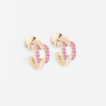 Paire de boucles d'oreilles en forme de maillon en or rose 18 carats serti de saphirs roses.